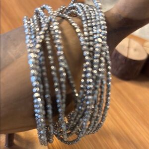 Elegant Silver irradescent multi strand Bracelet